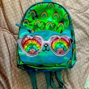 Girls Backpack will hold an 8 1/2 inch stuffed animal for size reference